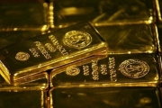الذهب يتراجع إلى 1317.46 دولار للأوقية مع صعود الأسهم وعوائد السندات الأمريكية