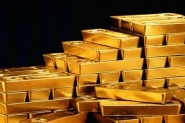 الذهب يرتفع مع تراجع الدولار والأسهم الأمريكية