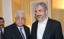 عباس يحاول اقناع مشعل بتقبل المبادرة المصرية