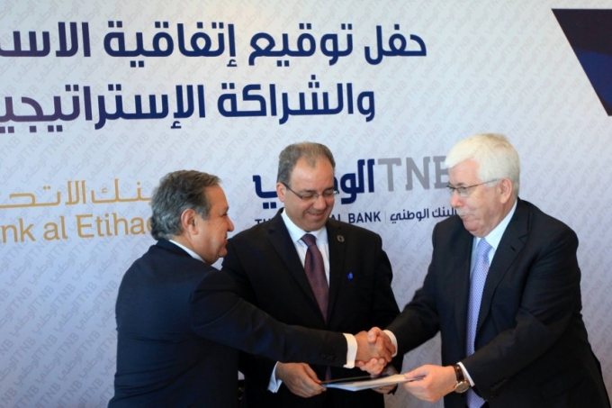 توقيع اتفاقية شراكه استراتيجية بين البنك الوطني وبنك الاتحاد الأردني تتضمن ضم اصول والتزامات بنك الاتحاد في فلسطين ليصبح شريكا بنسبه 10% في البنك الوطني