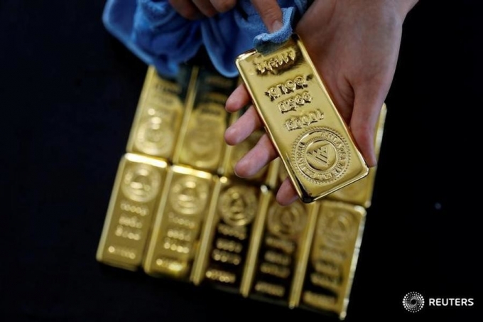الذهب يرتفع 1.5% إلى 1228 دولاراً